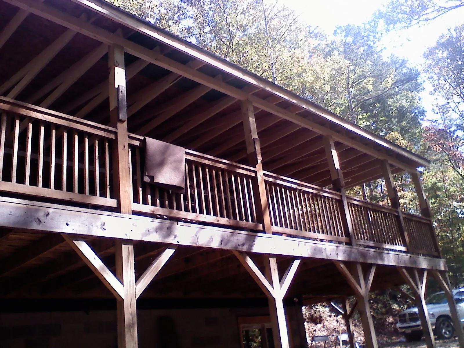 Timber framing under a new elevated porch and deck — Roof Leak Repair in Larchmont by Roofing Brothers